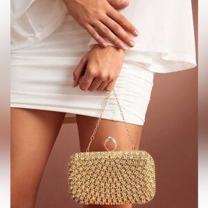 BNIB ELEGANT GOLD CLUTCH STUNNING FOR AN EVENING OUT OR SPECIAL OCCASION